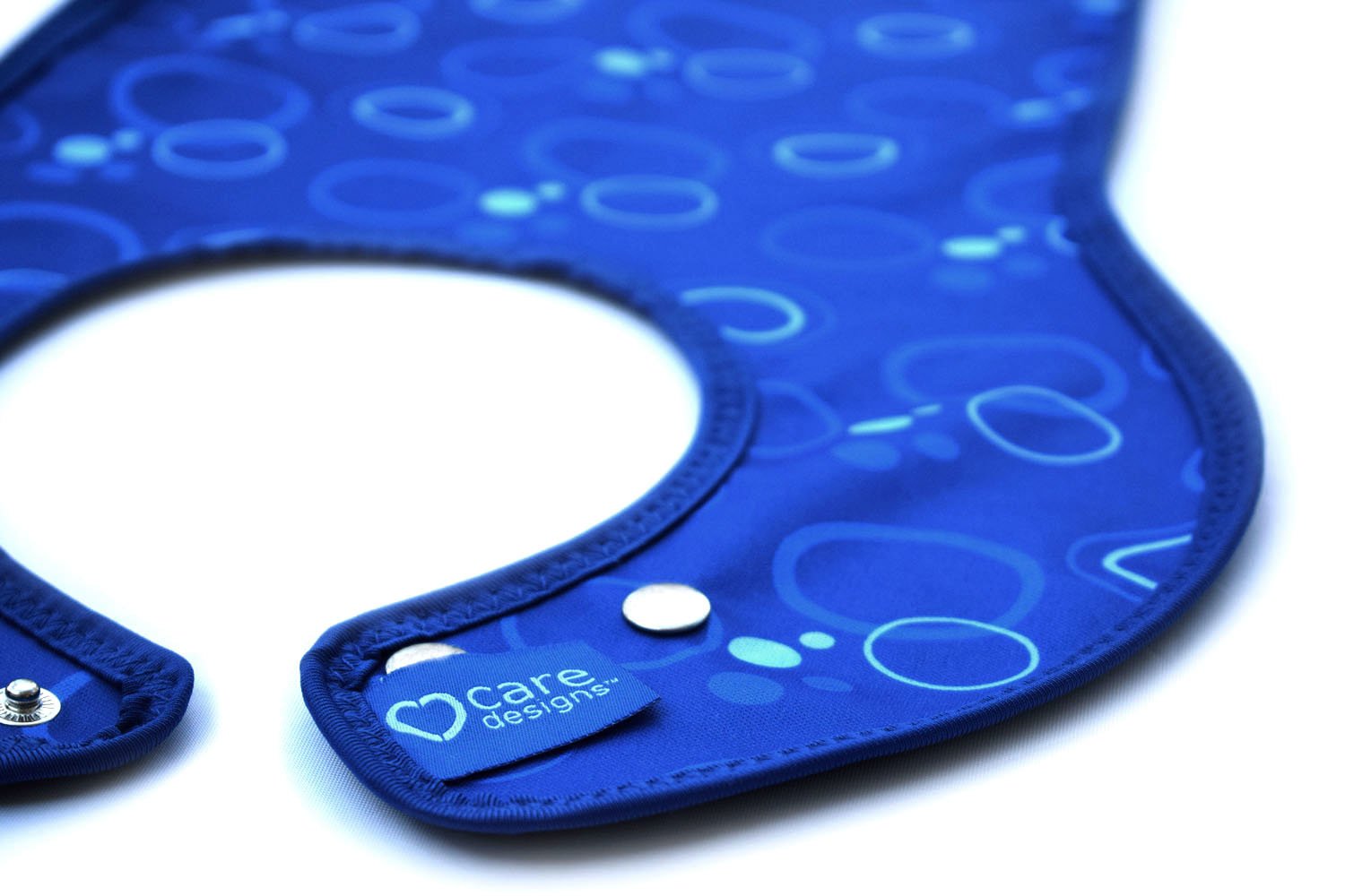 Care Designs- Junior Bib- Neck-01- Darker Blue Bubbles 72dpi