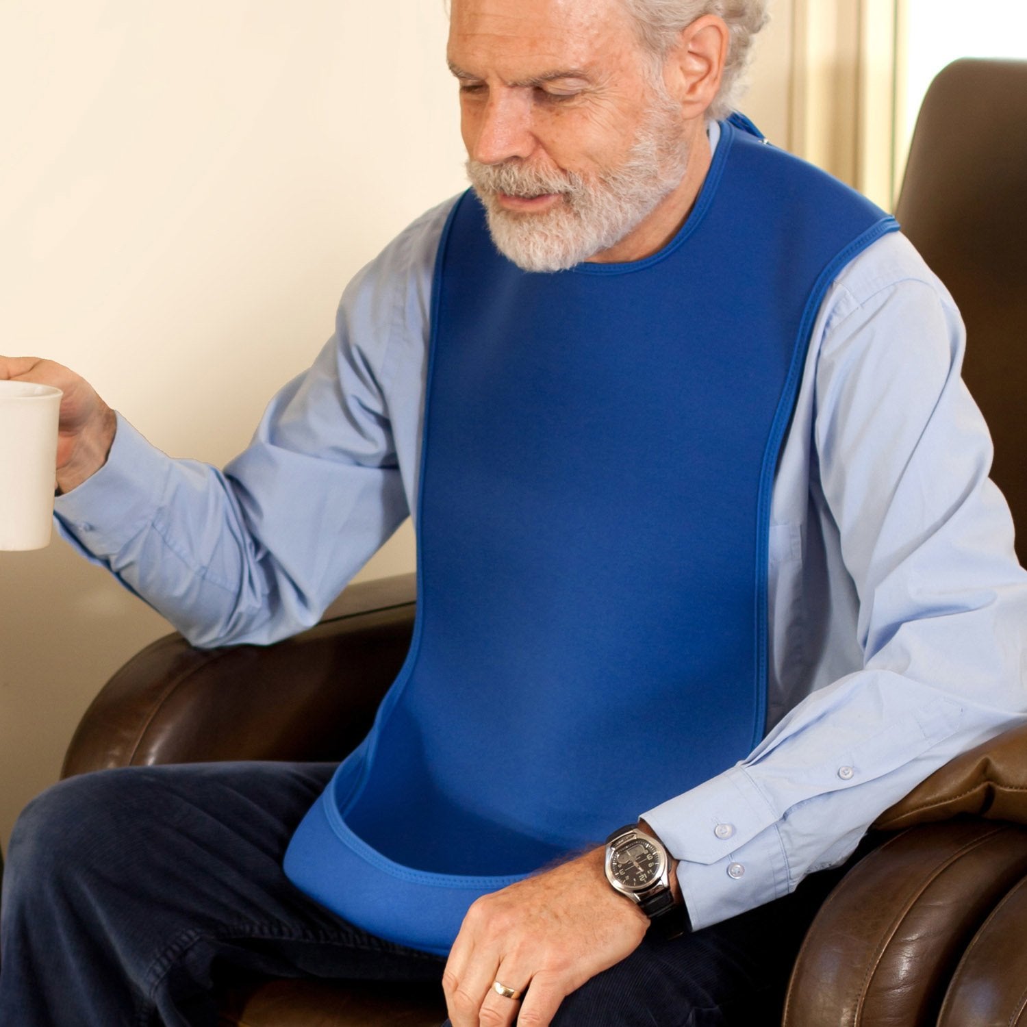 Care-Designs-Tabard-MEDIUM-Blue-on-man-1-1500x1500